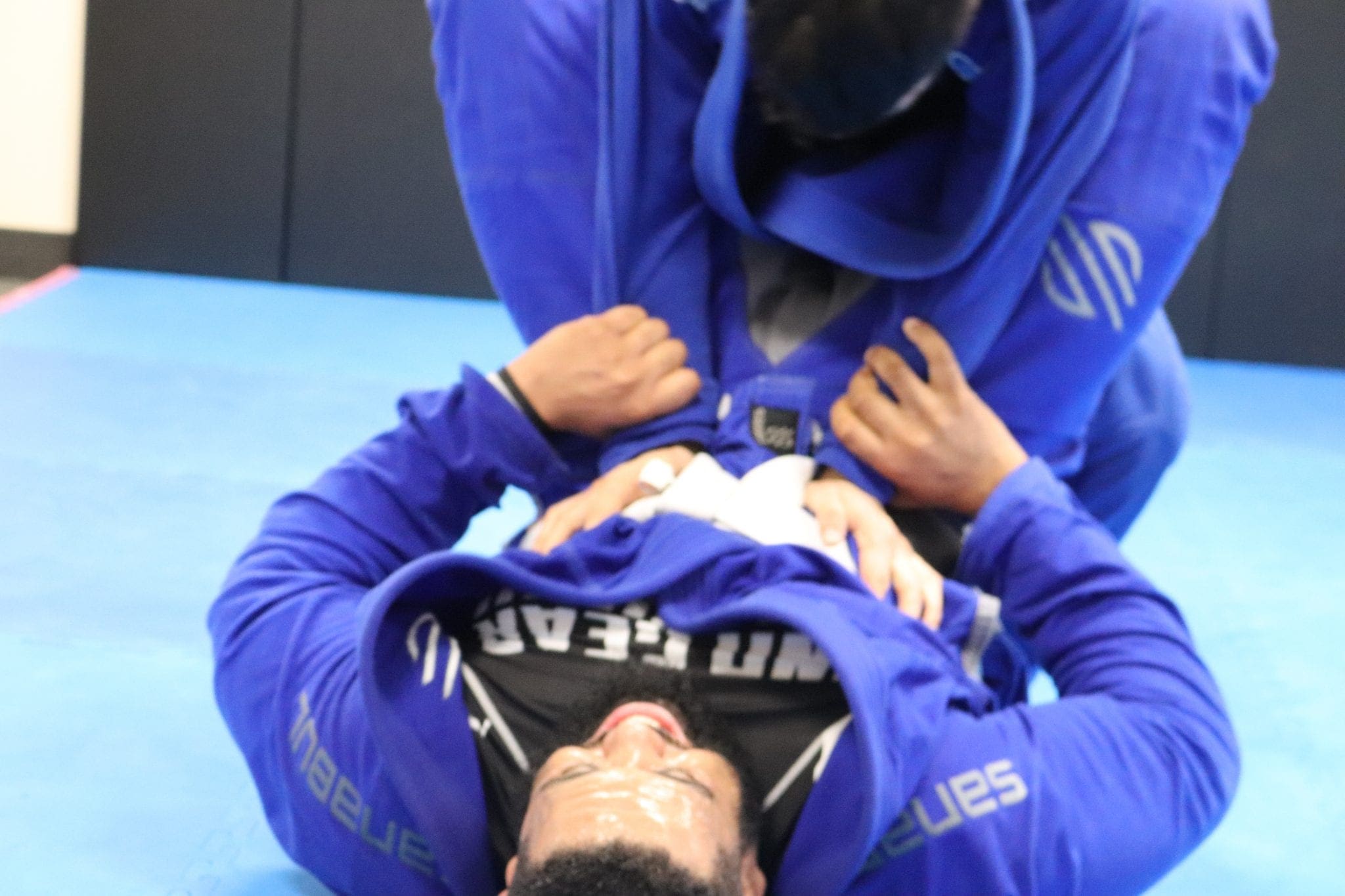 Some closed guard action in a bjj class