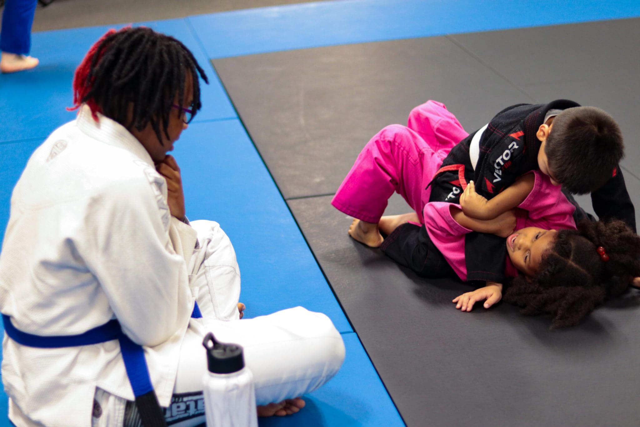 Jen helping out with the kids BJJ class.