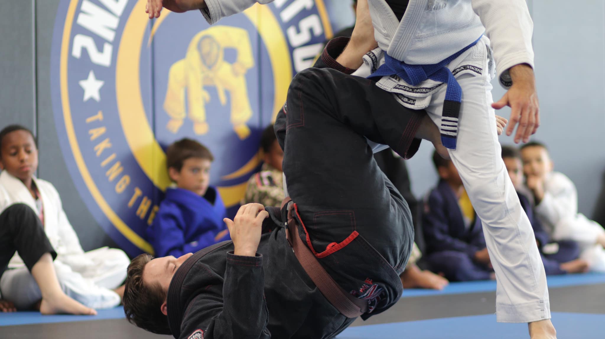 Griffin and Peter teaching the kids Jiu Jitsu class.